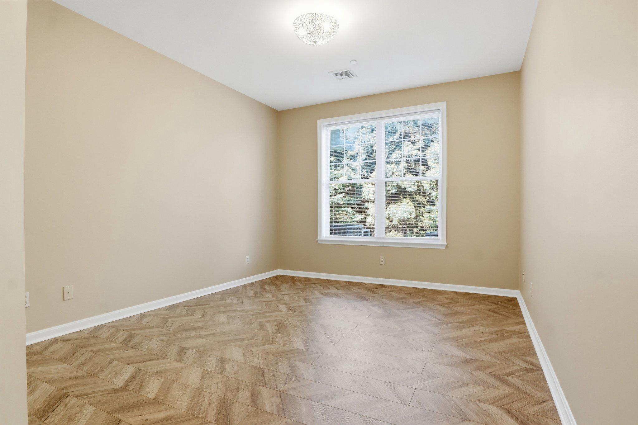 1010 Crest Way, Unit 103 York, PA 17403 - Photo 20 of 49 an empty room with windows
