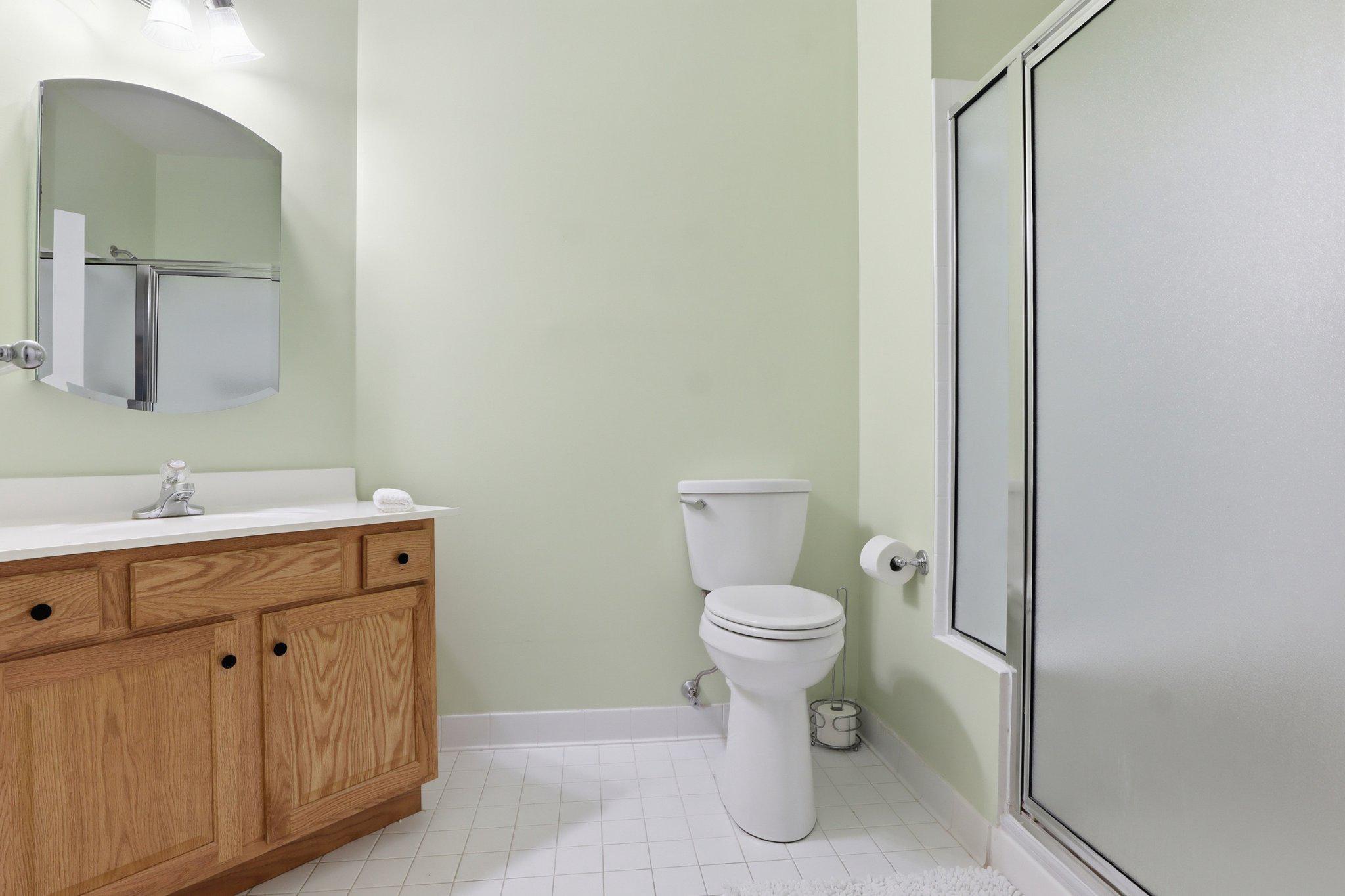 1010 Crest Way, Unit 103 York, PA 17403 - Photo 22 of 49 a bathroom with a toilet sink and a mirror
