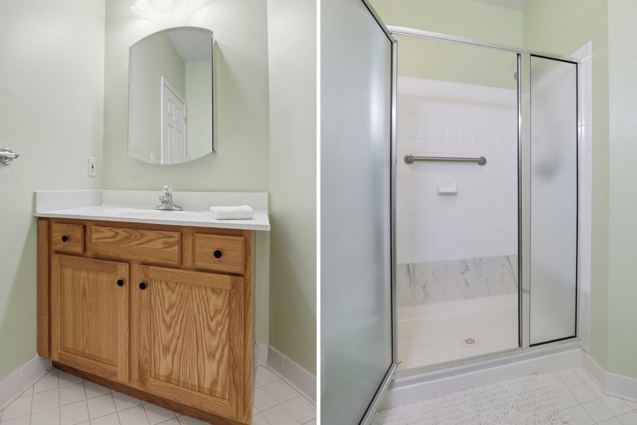 1010 Crest Way, Unit 103 York, PA 17403 - Photo 23 of 49 a bathroom with a shower sink and mirror