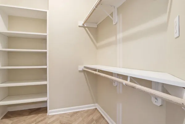 a view of an empty walk in closet