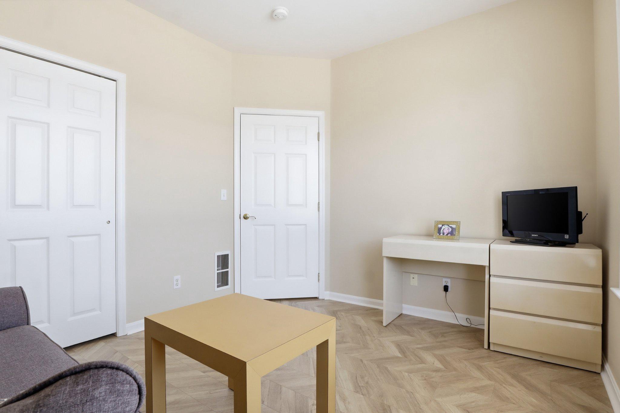 1010 Crest Way, Unit 103 York, PA 17403 - Photo 28 of 49 a room with a table and a couch