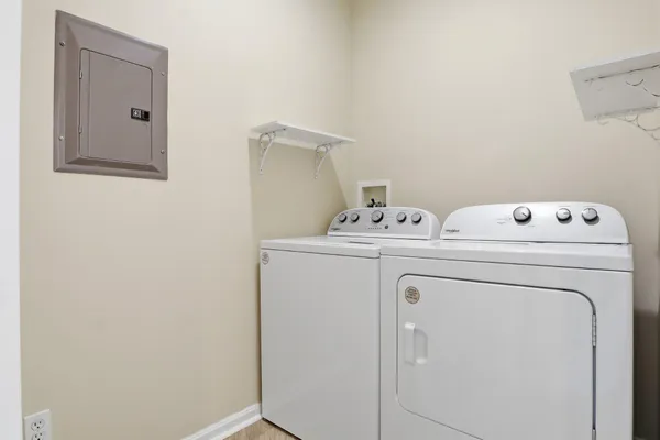 a utility room with dryer and washer