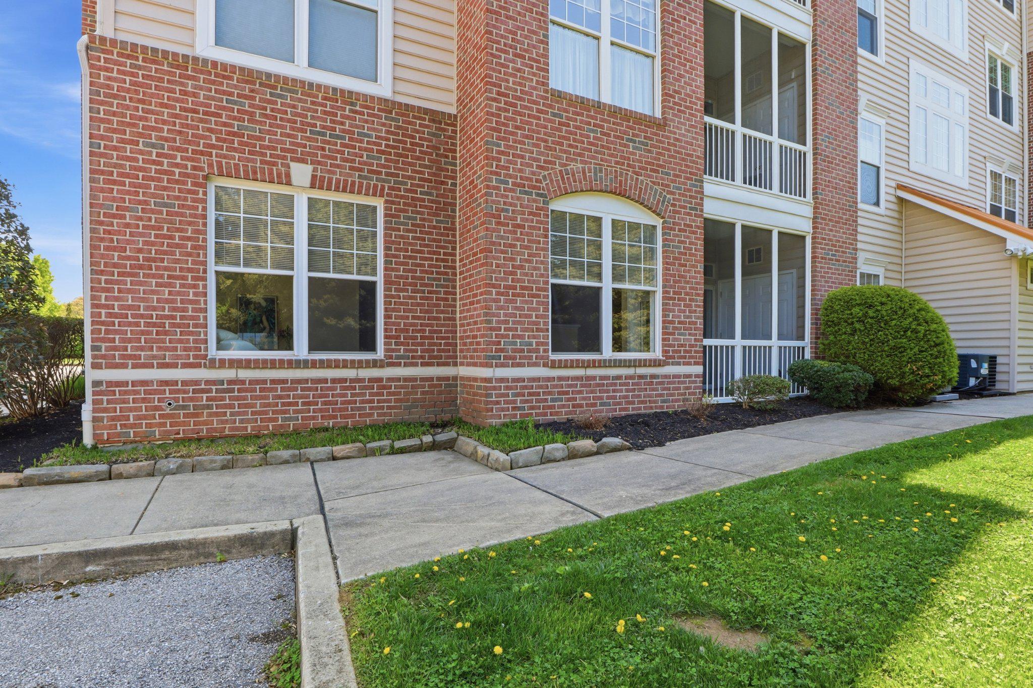 1010 Crest Way, Unit 103 York, PA 17403 - Photo 35 of 49 a front view of a house with garden