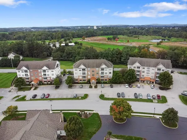 an aerial view of a house with garden view