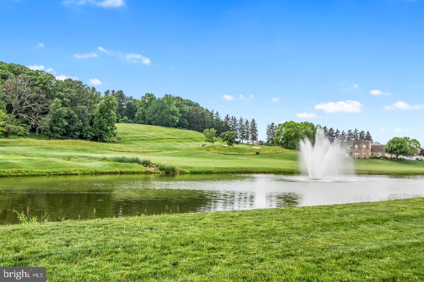 1010 Crest Way, Unit 103 York, PA 17403 - Photo 41 of 49 a view of a lake from a yard