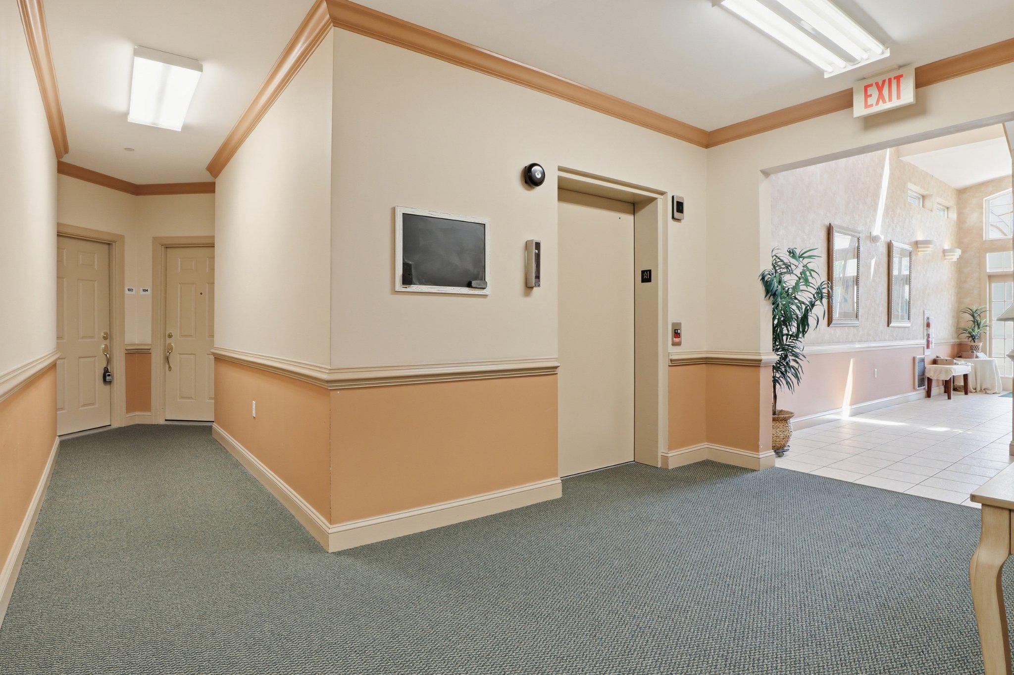 1010 Crest Way, Unit 103 York, PA 17403 - Photo 6 of 49 a view of a livingroom with an empty room