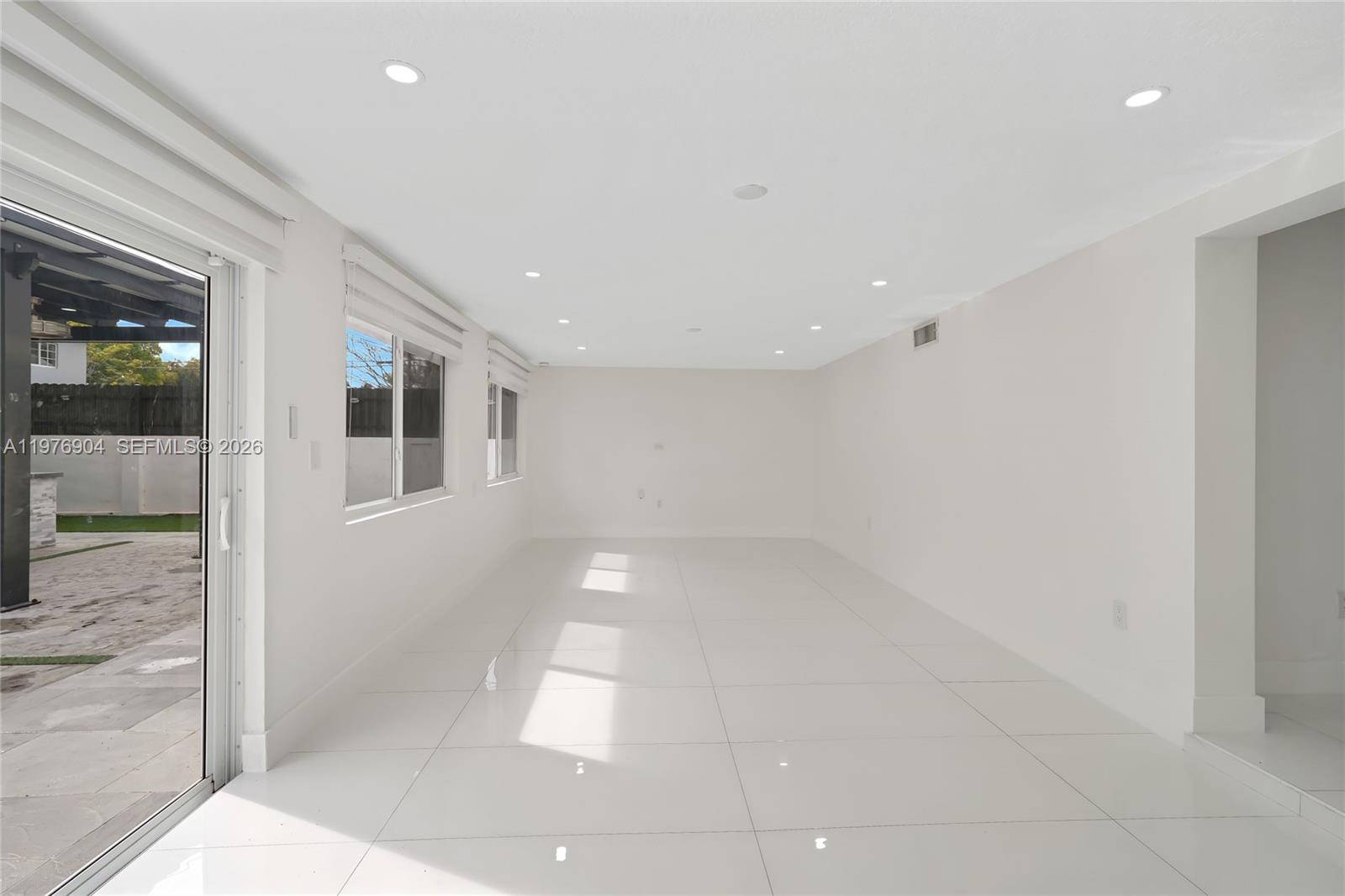 5635 West 13th Court Hialeah, FL 33012 - Photo 13 of 47 a view of a hallway