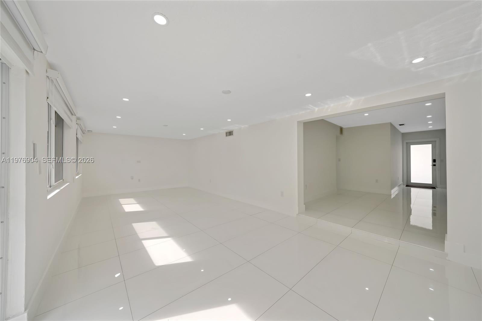 5635 West 13th Court Hialeah, FL 33012 - Photo 14 of 47 a view of an empty room