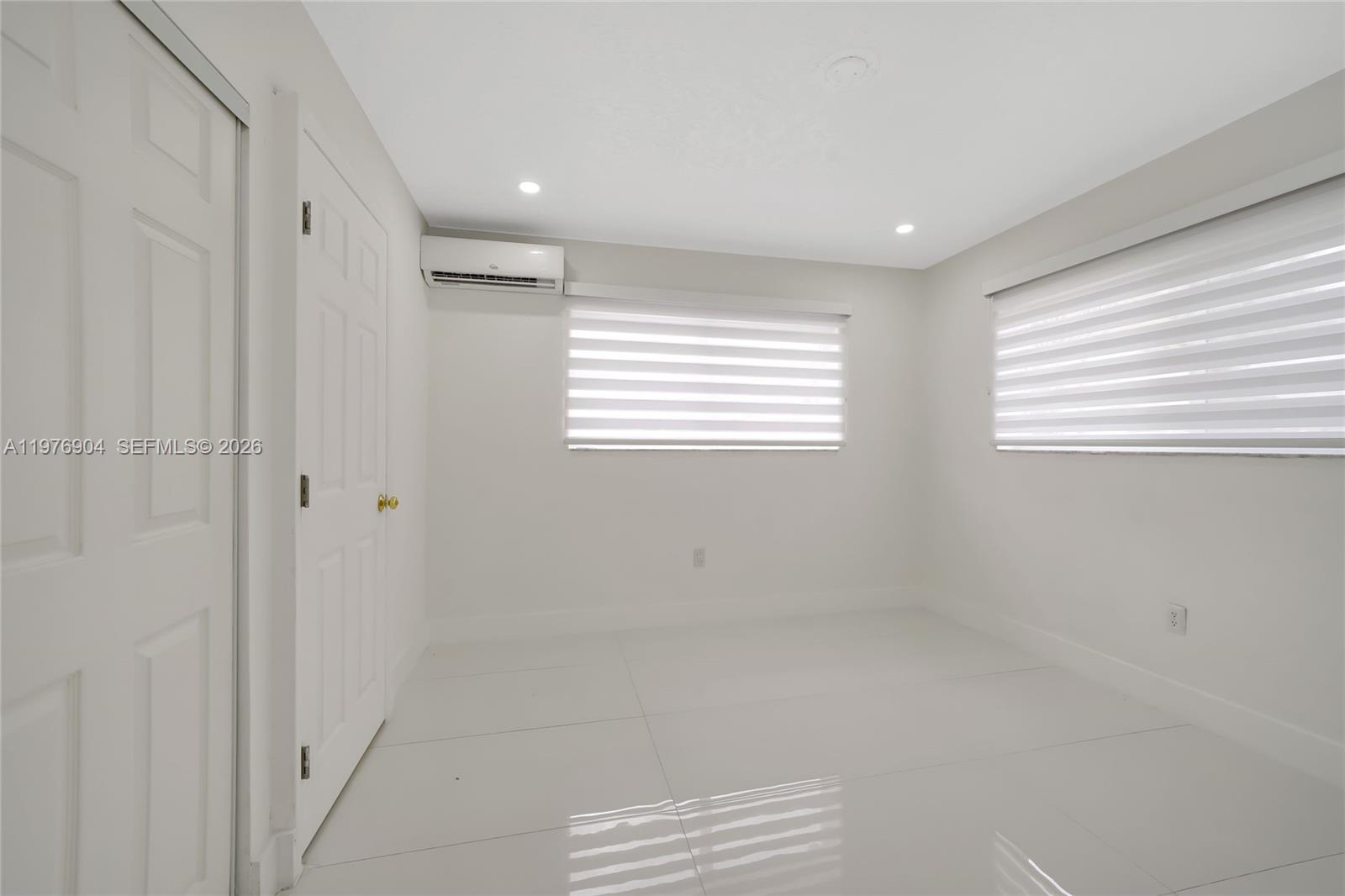 5635 West 13th Court Hialeah, FL 33012 - Photo 22 of 47 a view of room with window