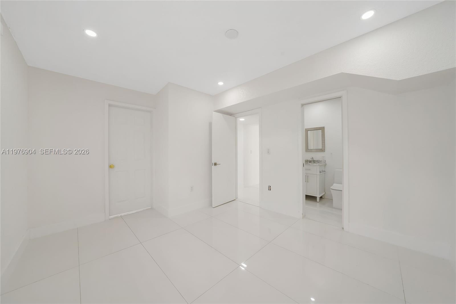 5635 West 13th Court Hialeah, FL 33012 - Photo 25 of 47 a view of an empty room