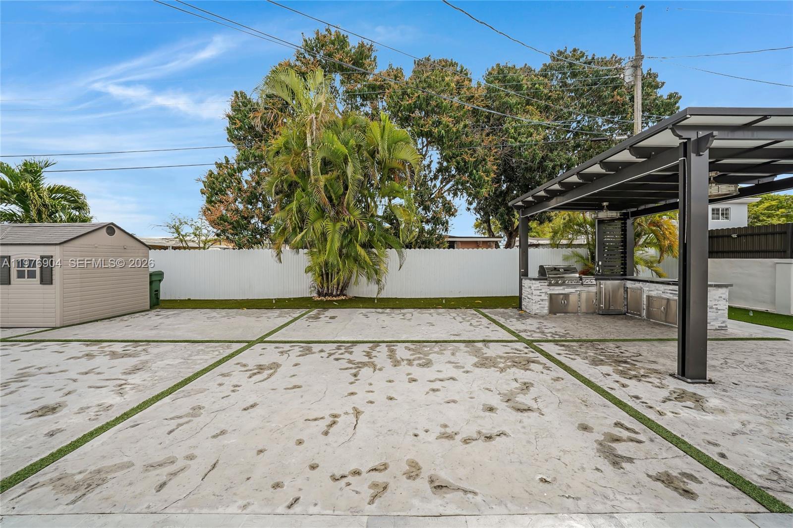 5635 West 13th Court Hialeah, FL 33012 - Photo 29 of 47 a view of a backyard of the house