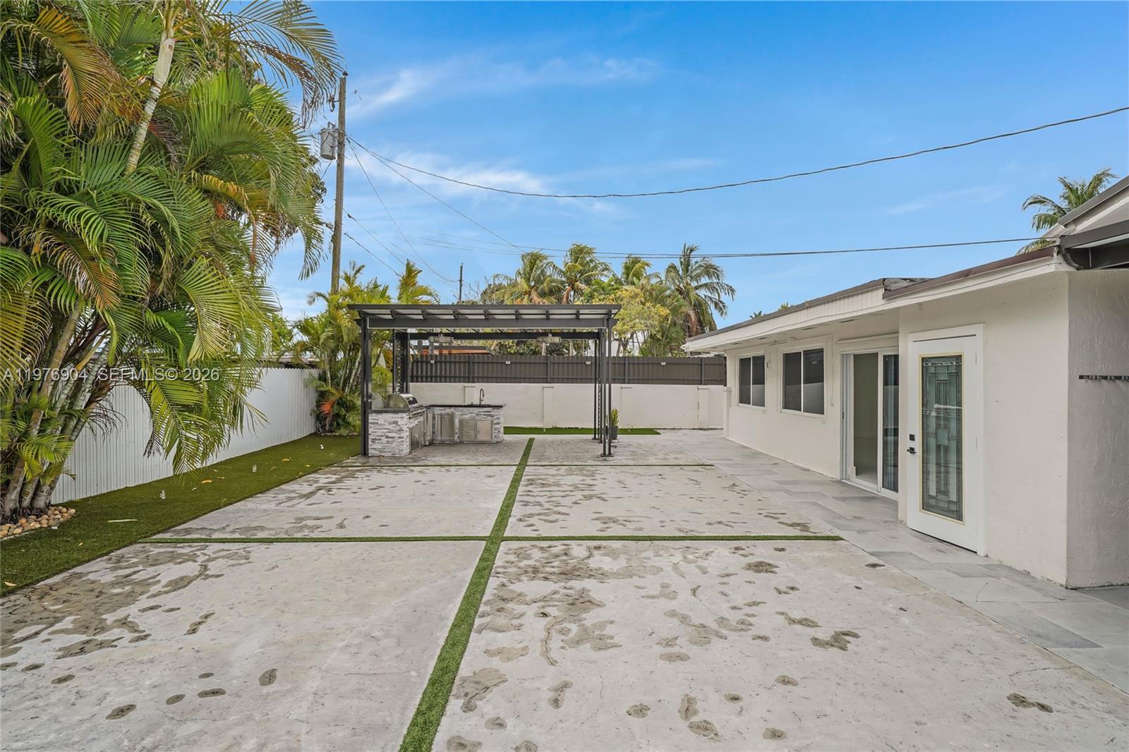 5635 West 13th Court Hialeah, FL 33012 - Photo 32 of 47 a view of a backyard of the house