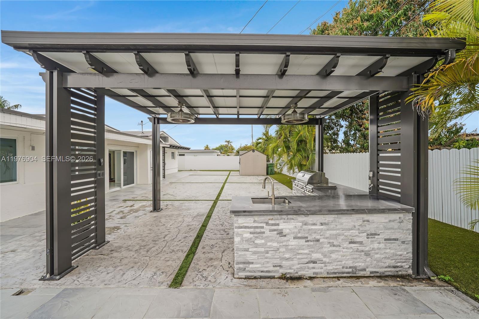 5635 West 13th Court Hialeah, FL 33012 - Photo 37 of 47 a view of a garage