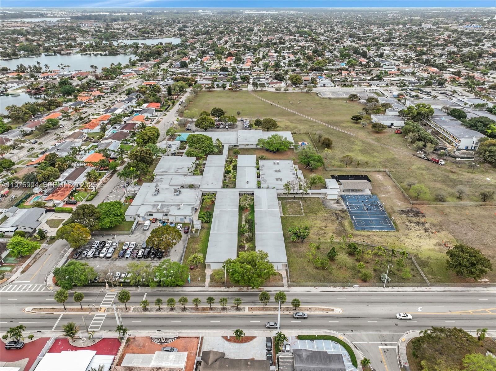 5635 West 13th Court Hialeah, FL 33012 - Photo 46 of 47 an aerial view of residential houses with outdoor space