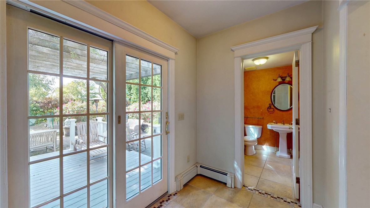 37 Woodlund Avenue Westerly, RI 02891 - Photo 18 of 45 Back hallway from Kitchen to backyard