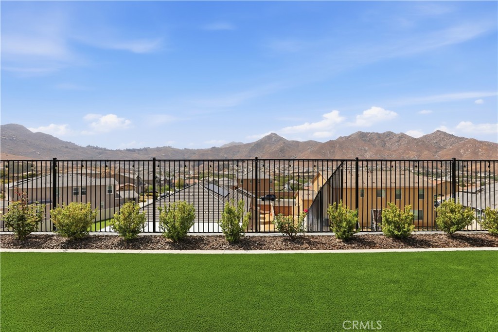 21159 Blue Jeans Court Riverside, CA 92507 - Photo 56 of 63 a view of a house with backyard and a garden