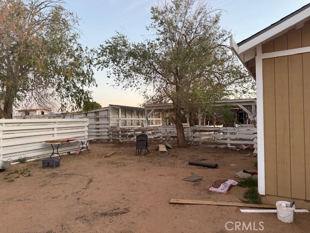 16100 Navajo Road Apple Valley, CA 92307 - Photo 28 of 55 a view of a house with backyard and sitting area