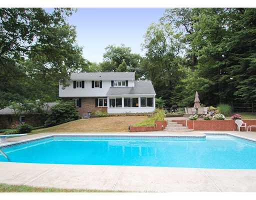 216 Woodcroft Road Economy, PA 15005 - Photo 2 of 18 Exterior Back. Rear of Home Shows the Inviting Pool Pool, Sunroom Addition, Brick Patio - Pool has Heater and Solar Summer Cover and Winter Cover - Great for Family Enjoyment and Entertaining!