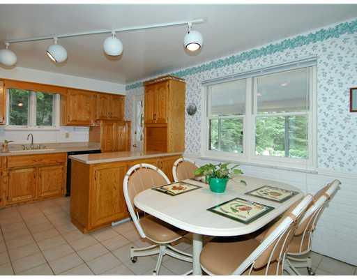 216 Woodcroft Road Economy, PA 15005 - Photo 4 of 18 Kitchen. Remodeled Bright Table Space Kitchen with Ceramic Floors, Hard Surface Counters opens to the Sunroom. Large Pantry, Small Appliance "cubby", Overhead Lighting all add to the Convenience of the Kitchen.