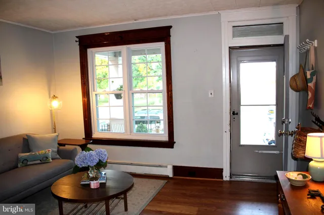 a view of entryway with wooden floor