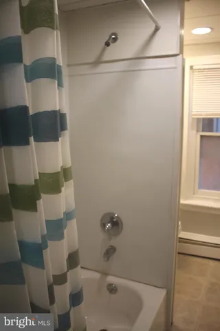 a view of a door and a window