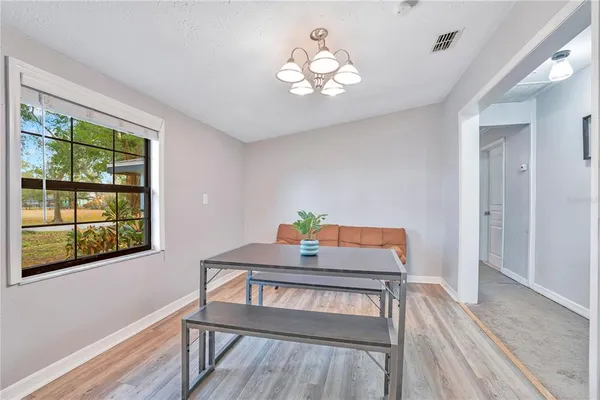 a workspace with furniture and window