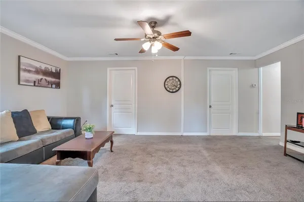 a living room with furniture and a window