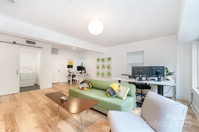 a bedroom with a bed and furniture