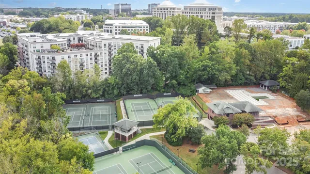 a view of a backyard with sitting area