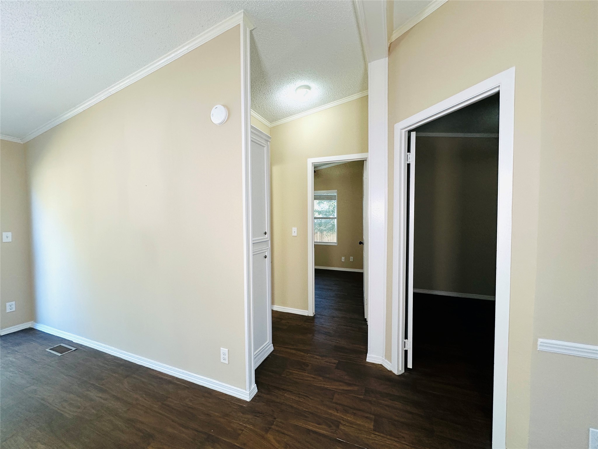 16497 Spring Rain Court Conroe, TX 77302 - Photo 10 of 18 a view of a hallway with wooden floor