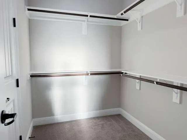 a view of a room with racks on the wall