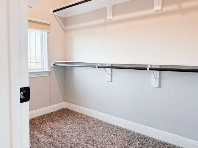 a view of a walk in closet