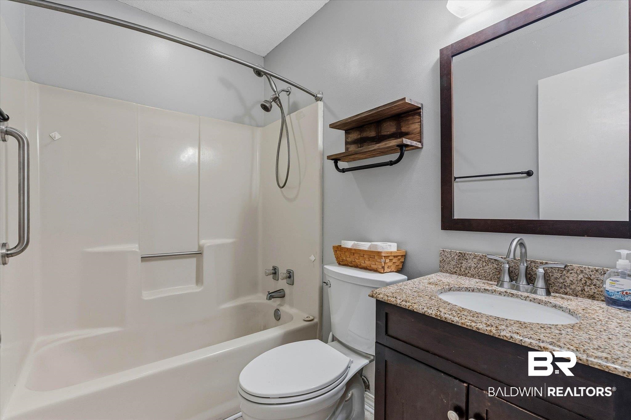 8030 Country Drive Mobile, AL 36619 - Photo 13 of 22 Full bathroom with vanity and washtub / shower combination
