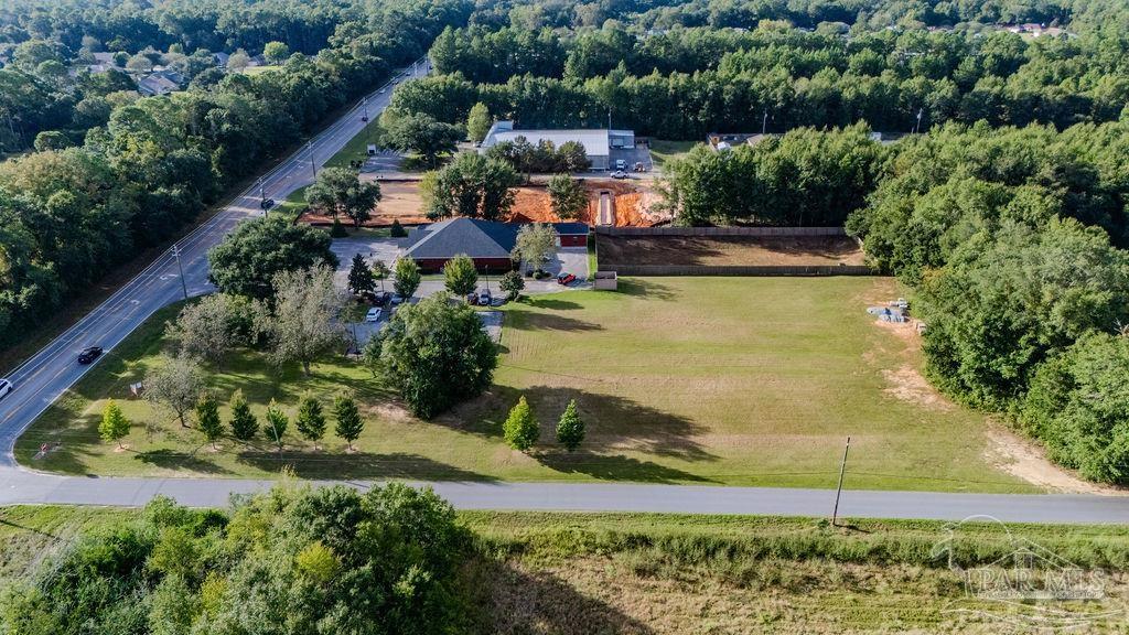 Woodbine Road Pace, FL 32571 - Photo 16 of 21 an aerial view of a house with a yard basket ball court and outdoor seating