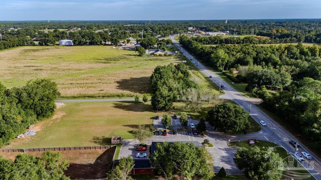 Woodbine Road Pace, FL 32571 - Photo 9 of 21 a view of a city and a mountain view