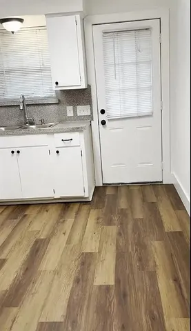 a view of a kitchen with a sink