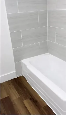 a bathroom with a bathtub