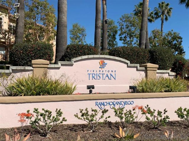 a view of a sign on the side of the road