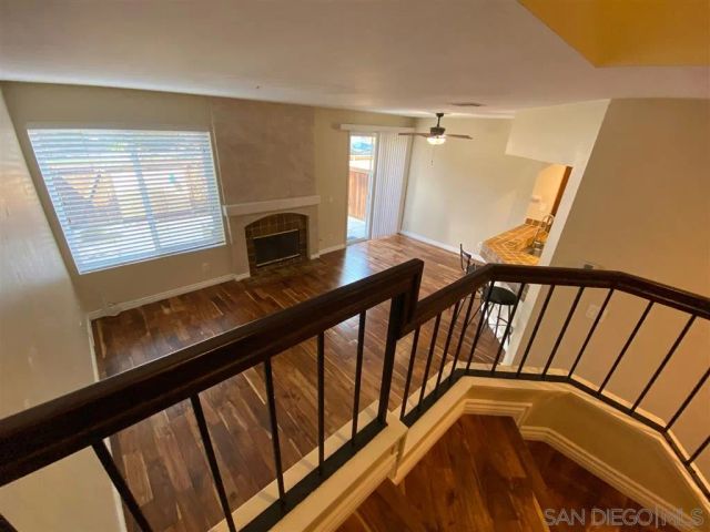 a view of empty room with a ceiling fan