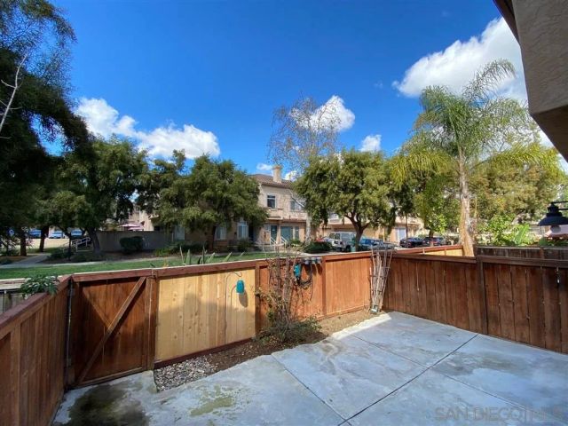 a view of a garden with sitting area