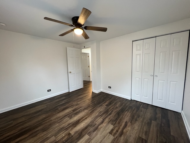Undisclosed Address Naperville, IL 60565 - Photo 10 of 23 a view of empty room with wooden floor and fan