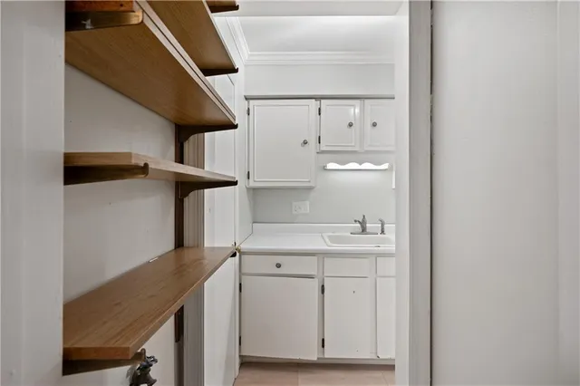 a bedroom with bed and a window