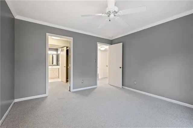 a view of storage and utility room with washer and dryer