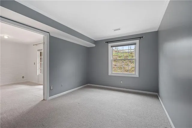 a bathroom with a sink vanity granite and toilet