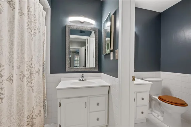 a view of a balcony with wooden floor