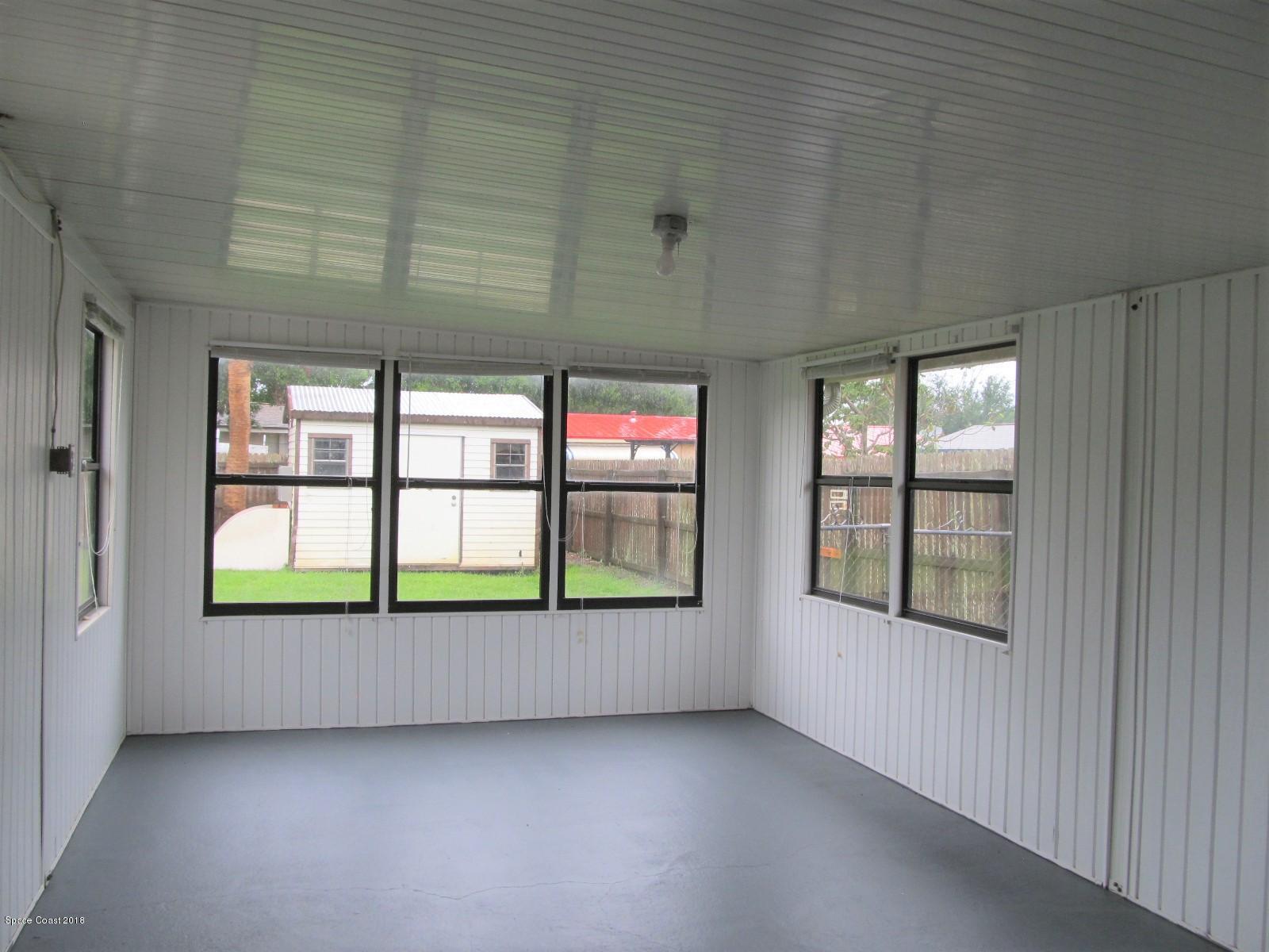 2358 Sarno Road Melbourne, FL 32935 - Photo 12 of 16 Enclosed Porch