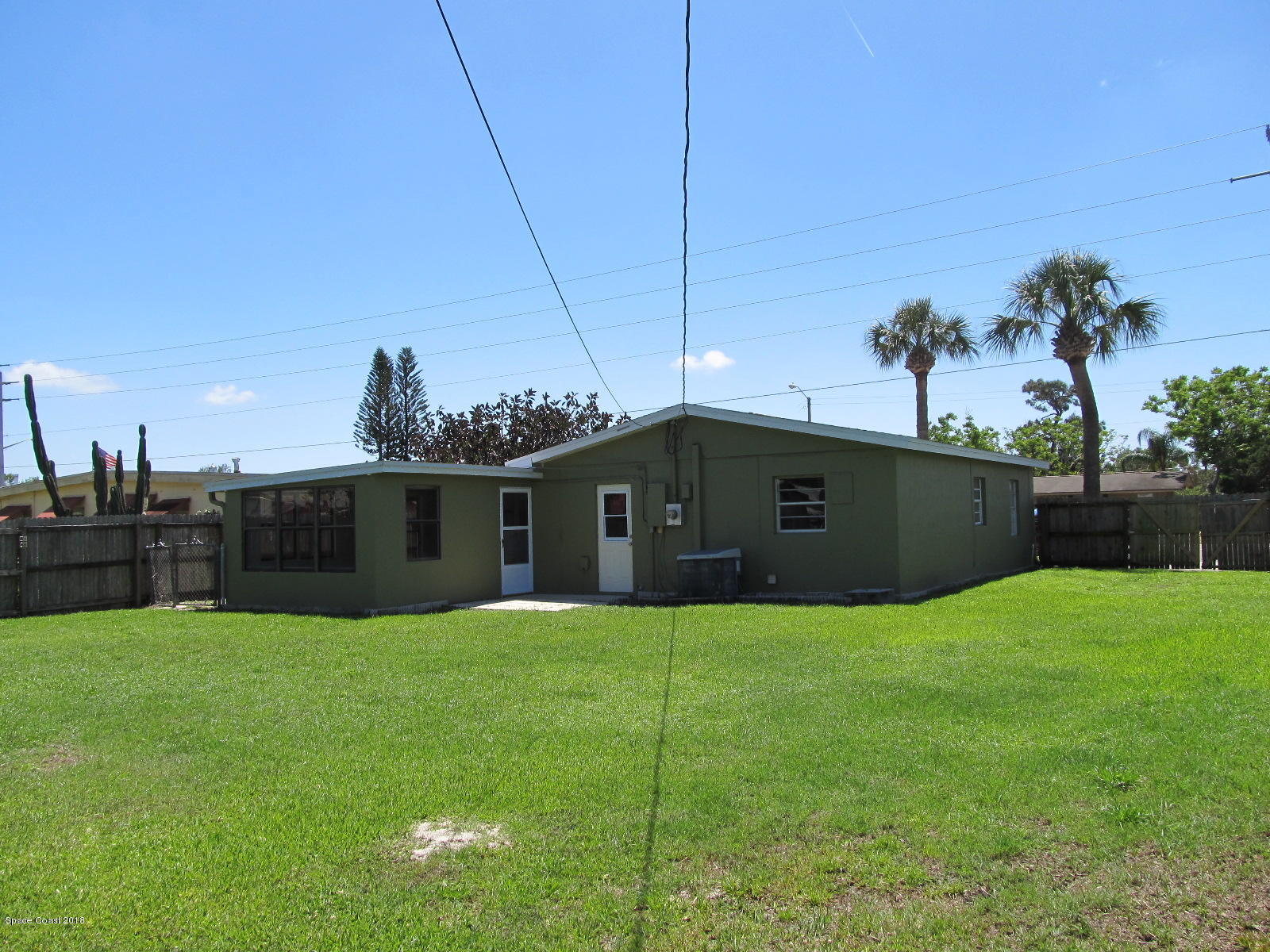 2358 Sarno Road Melbourne, FL 32935 - Photo 15 of 16 Well Irrigated Backyard