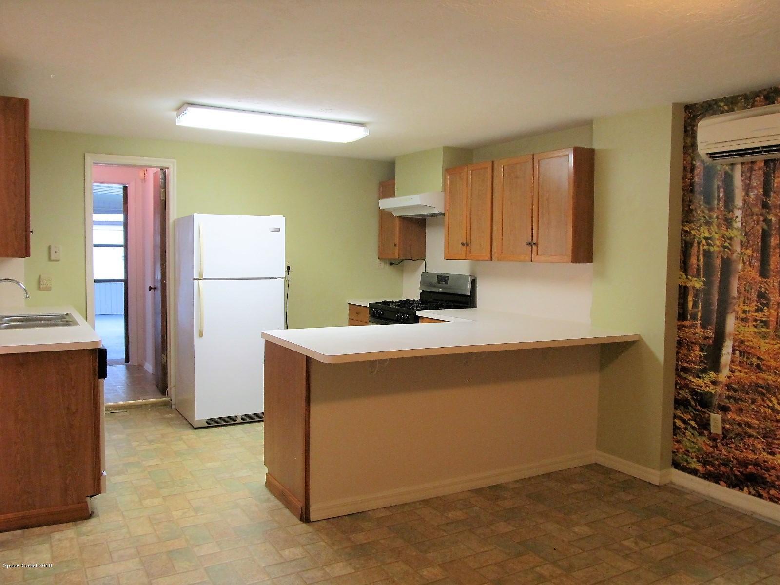 2358 Sarno Road Melbourne, FL 32935 - Photo 4 of 16 Gas Stove, Fridge, Dishwasher