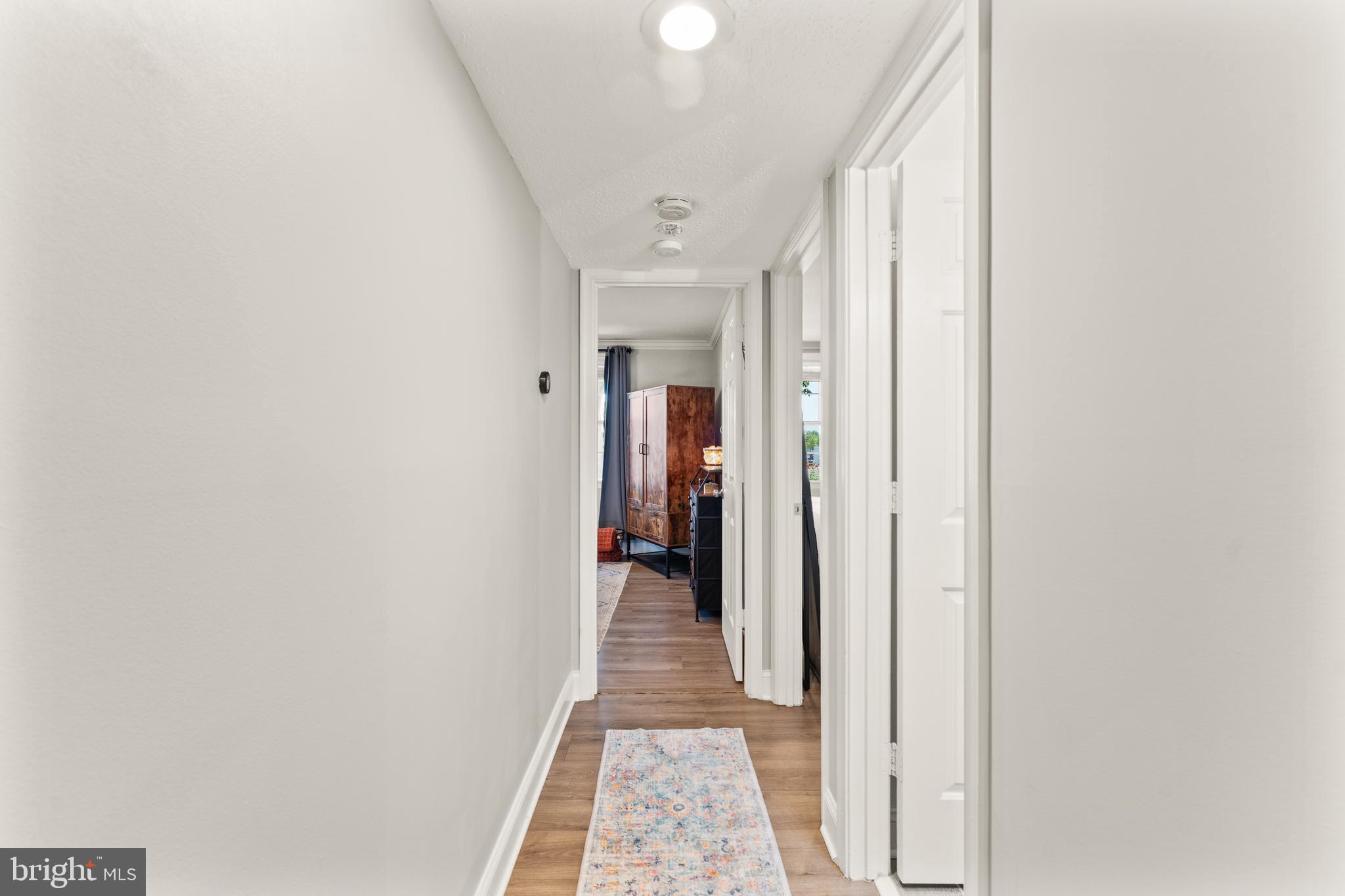 124 Fort Evans Road Southeast, Unit B Leesburg, VA 20175 - Photo 13 of 39 Heading to the primary suite...