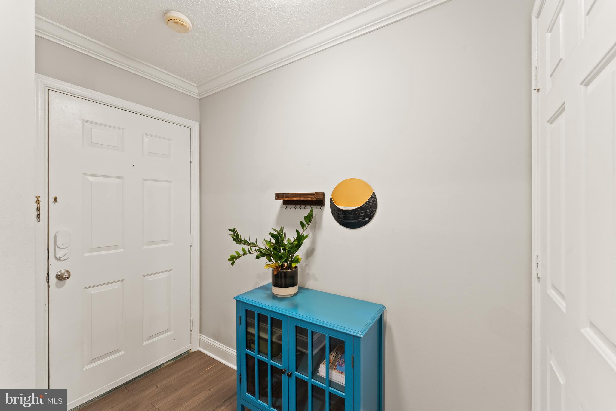 124 Fort Evans Road Southeast, Unit B Leesburg, VA 20175 - Photo 27 of 39 Sufficient space for coat rack